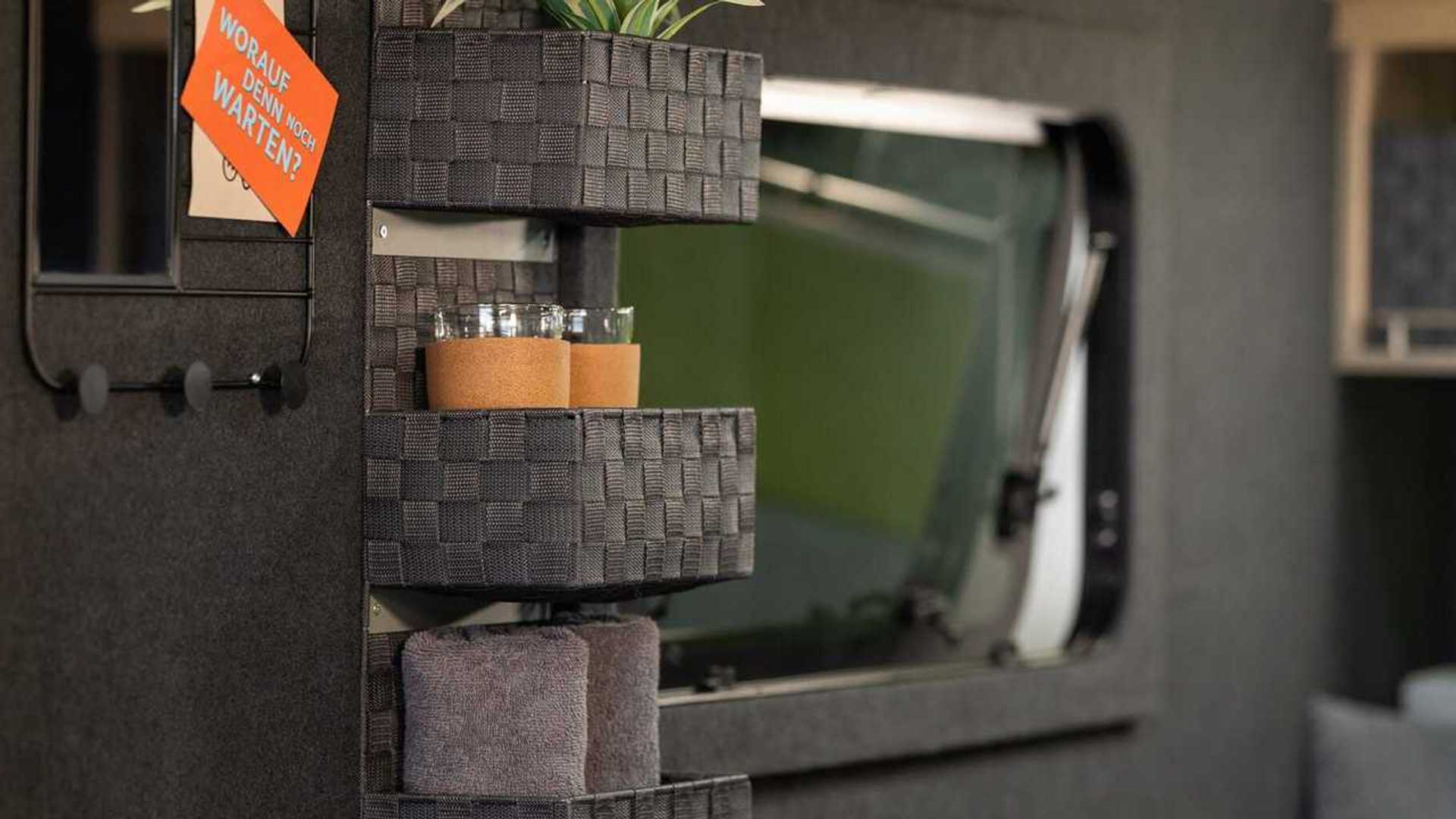 German company converts compact utility trailer to cozy camper for two