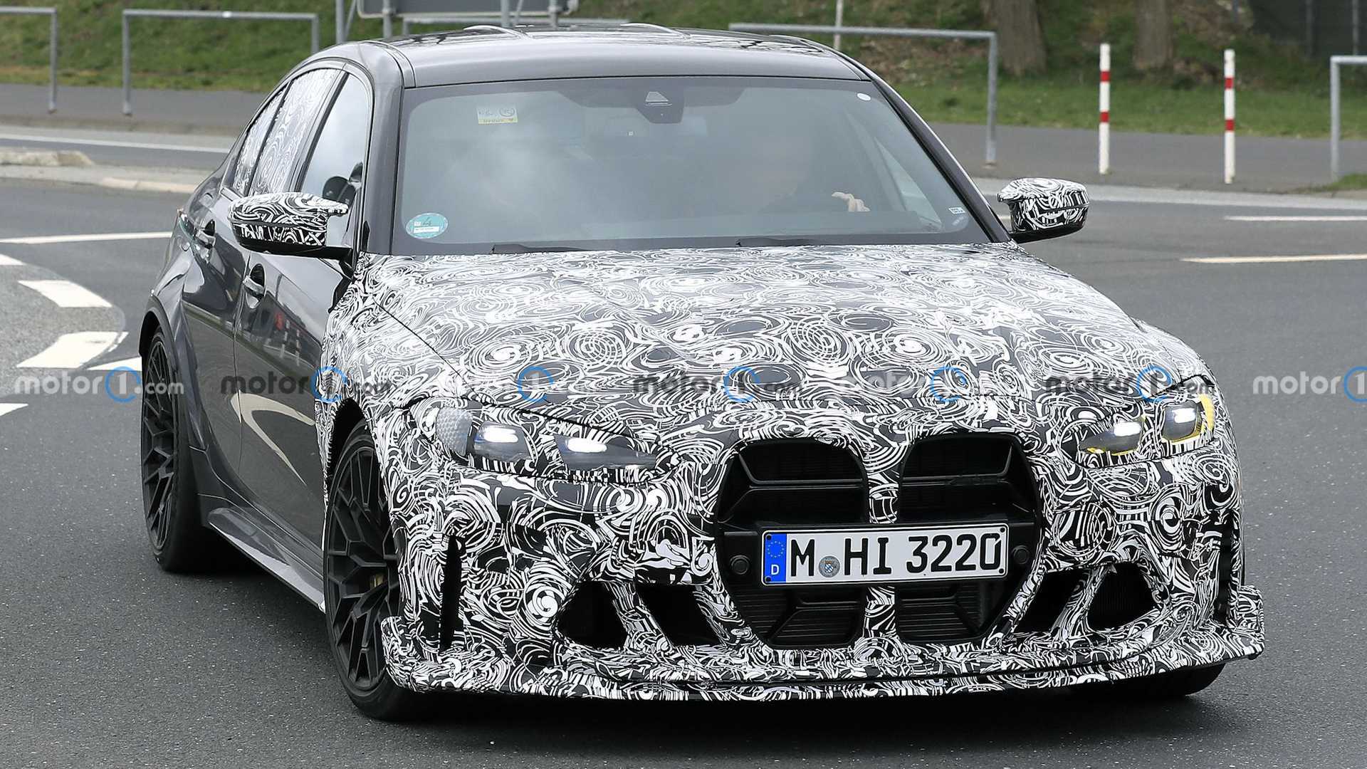 BMW M3CS Drops Heavy Camo and Shows Off Face in New Spy Photos